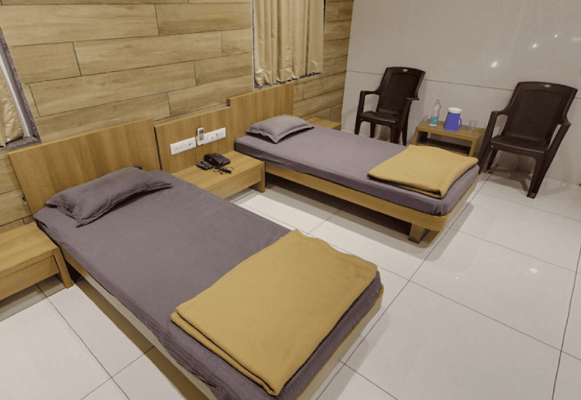 Twin room at Saurashtra Leuva Patel Samaj Bhavan
